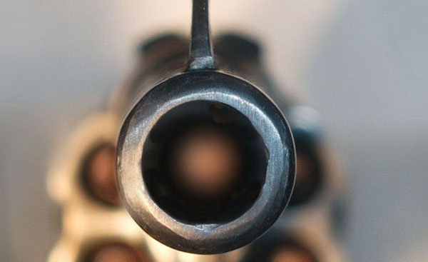 pointed gun stock photo